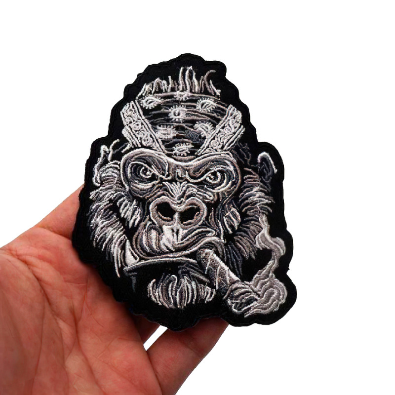 Gothic embroidered patch of a big gorilla with a cigar, perfect for adding style to clothes.