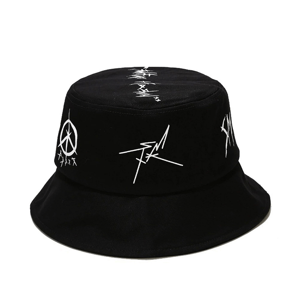 Black patchwork graffiti cotton bucket hat with unique designs, perfect for unisex casual style and travel.