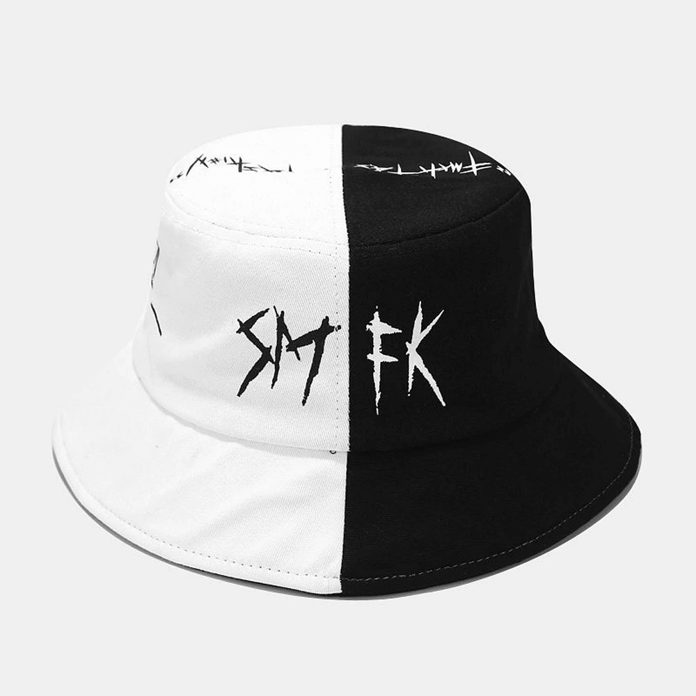Stylish patchwork graffiti bucket hat in black and white, perfect for unisex casual travel and everyday fashion.
