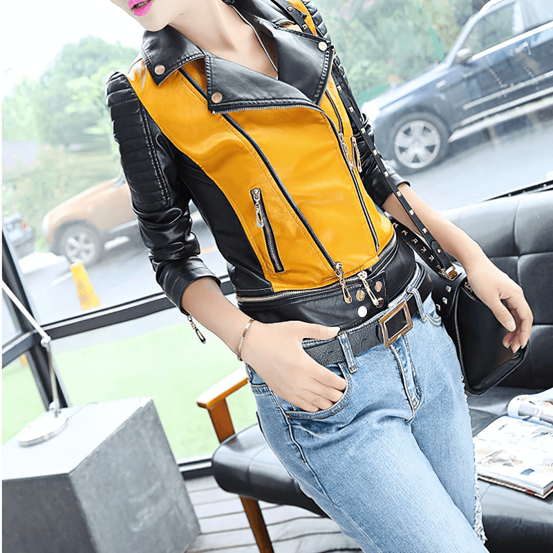 Stylish women’s patchwork PU leather motorcycle jacket in yellow and black with zippers, perfect for casual outings.