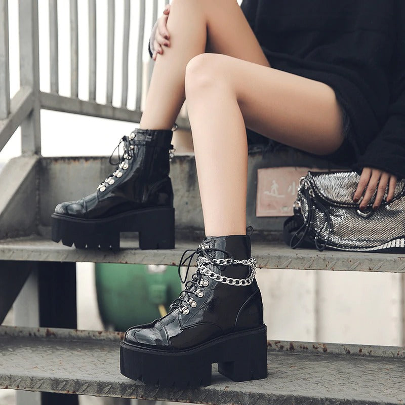Gothic black platform ankle boots with double chain detail, perfect for stylish winter looks.