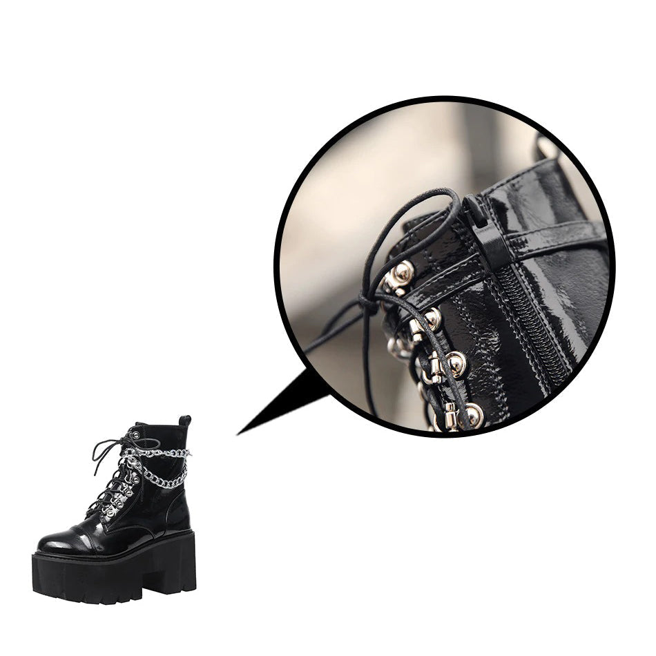 Gothic women's black platform boots with double chain detail and ankle zipper, perfect for fall and winter fashion.