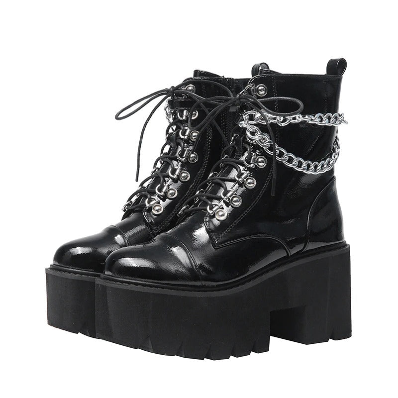 Gothic women's black patent leather platform boots with chain decoration and ankle zipper, stylish and comfortable.