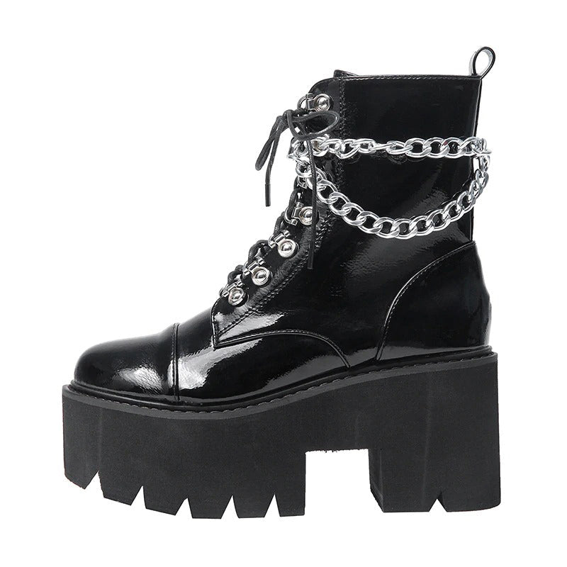 Gothic women's black patent leather platform boots with double chain and zipper, perfect for stylish autumn and winter outfits.
