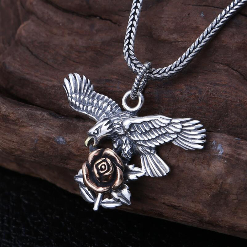 Sterling silver pendant featuring an eagle grasping a rose, perfect for unisex jewelry enthusiasts. 925 classic design.