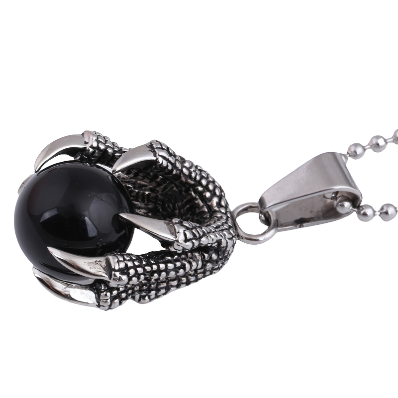 Stainless steel pendant with black stone crystal in dragon's claw design for men and women, perfect for layering.