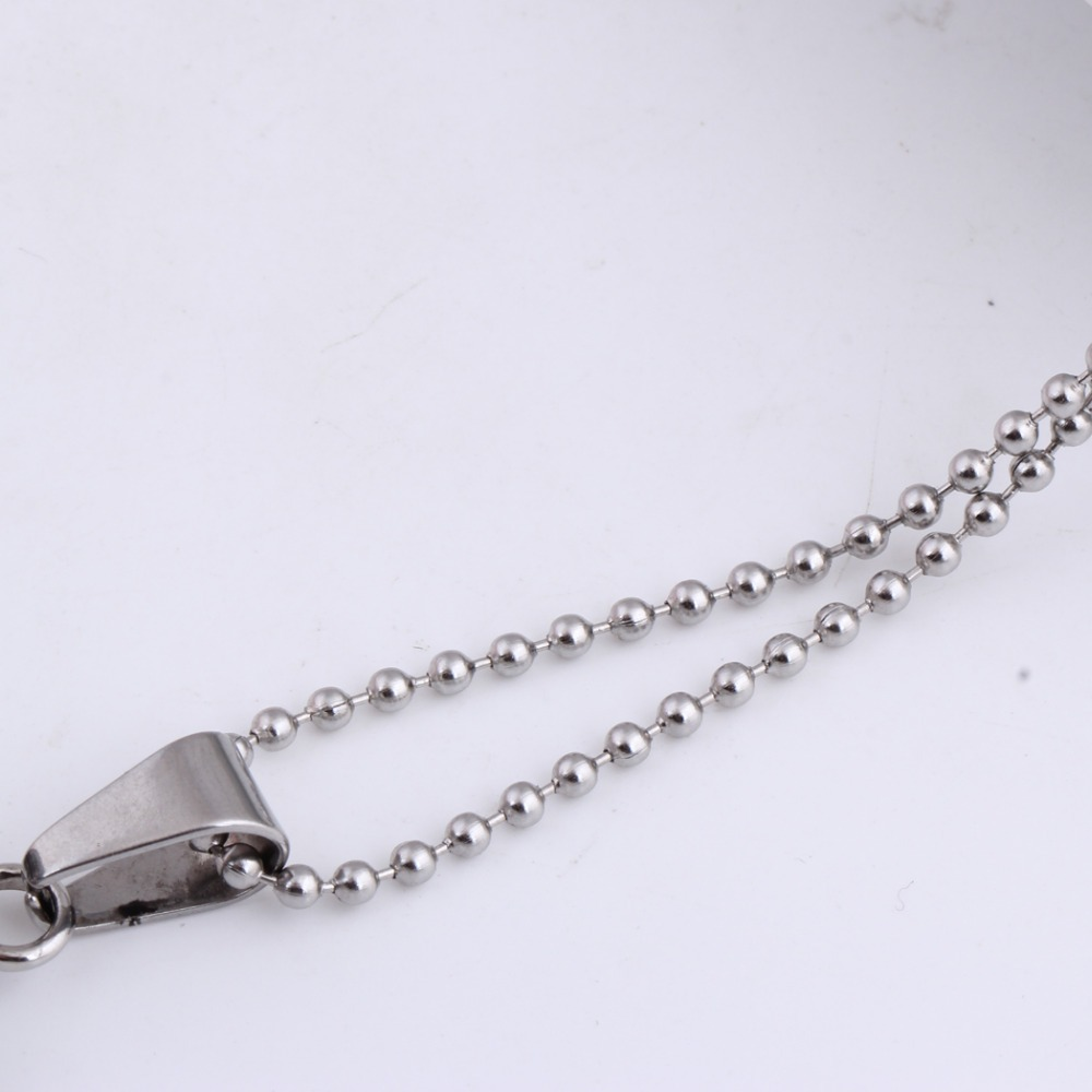 Close-up of a stainless steel beaded necklace chain with a secure clasp for a trendy pendant.