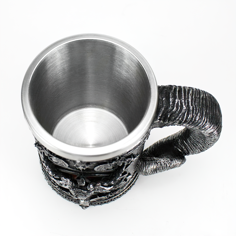 Stainless steel pentagram beer mug showcasing intricate demon design, perfect for unique drinkware gifts.