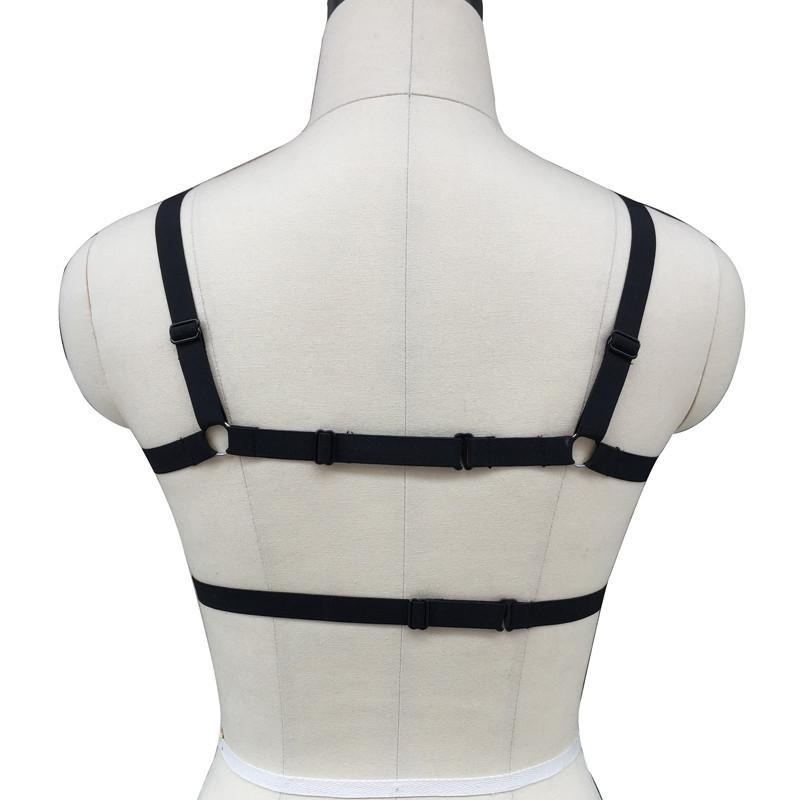 Back view of a gothic pentagram women bra body bondage harness showcasing its unique strap design.