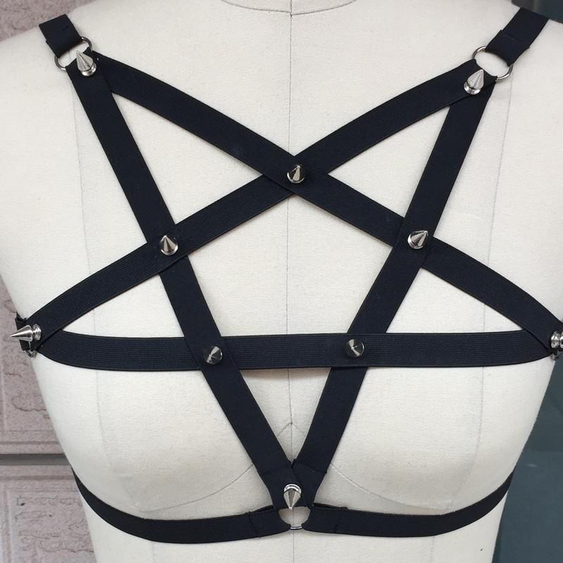 Back view of a black pentagram harness with spikes, perfect for gothic and rock fashion.