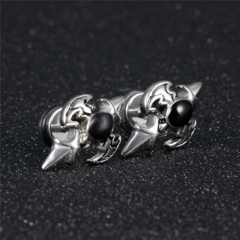Alternative fashion stainless steel cross design stud earrings with black zirconia accents for a bold look.