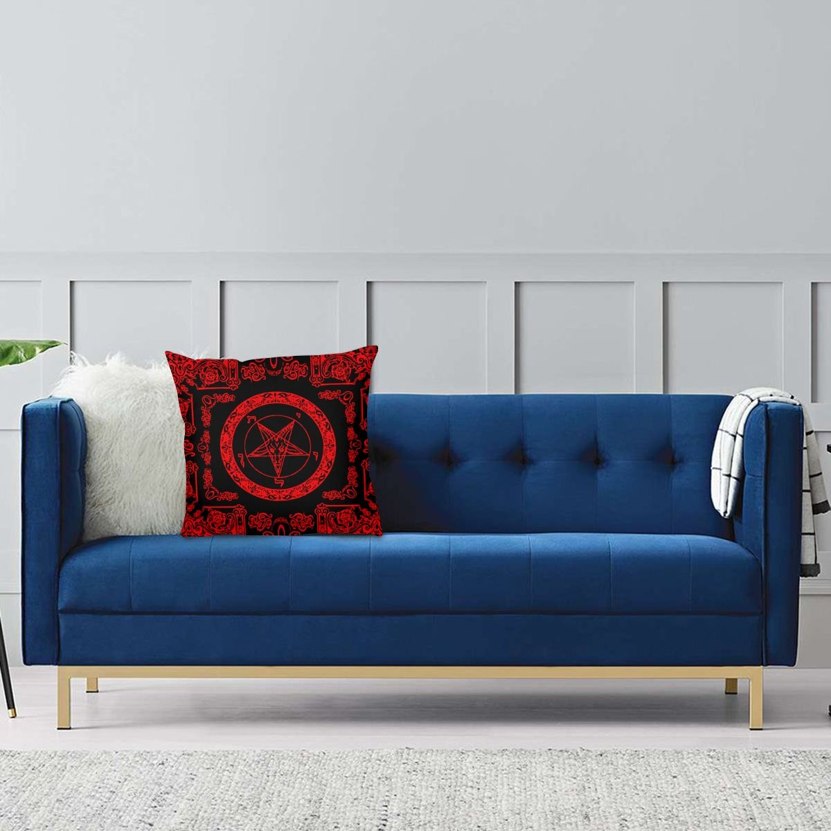 Gothic pillowcase with satanic signs on a blue sofa, perfect for home decor.
