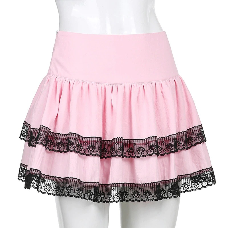 Stylish pink double layer pleated mini skirt with black lace trim for a chic punk look.