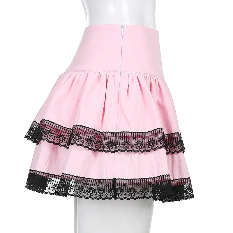 Pink double layer pleated skirt with black lace trim, perfect for stylish punk outfits and everyday wear.