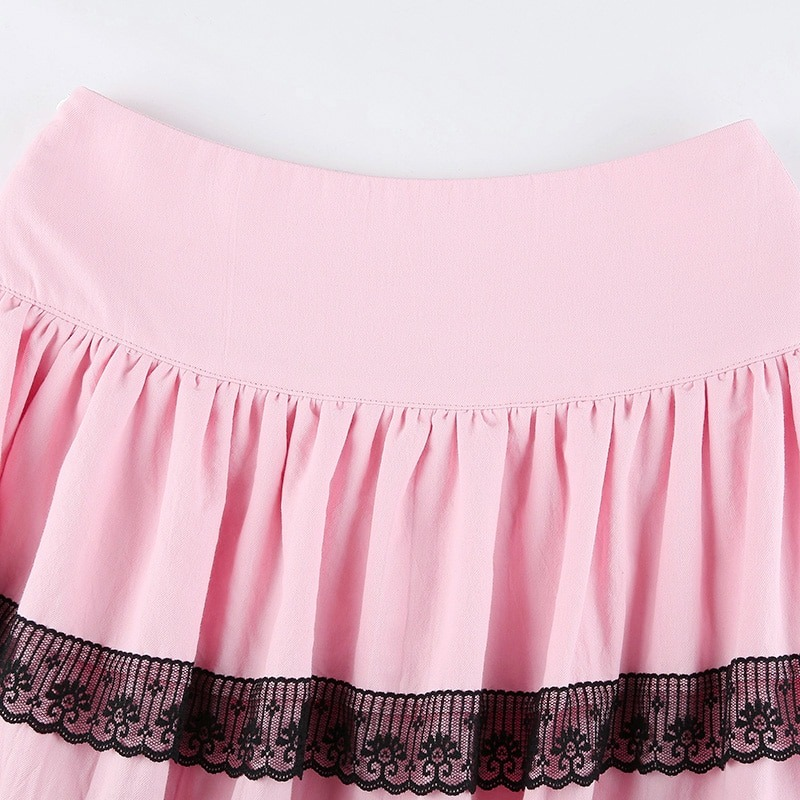 Pink women's double layer pleated skirt with black lace trim, perfect for stylish punk fashion.