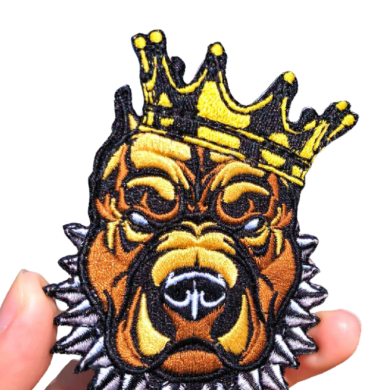 Pitbull dog patch in a crown, unisex rock style accessory for jackets and bags.