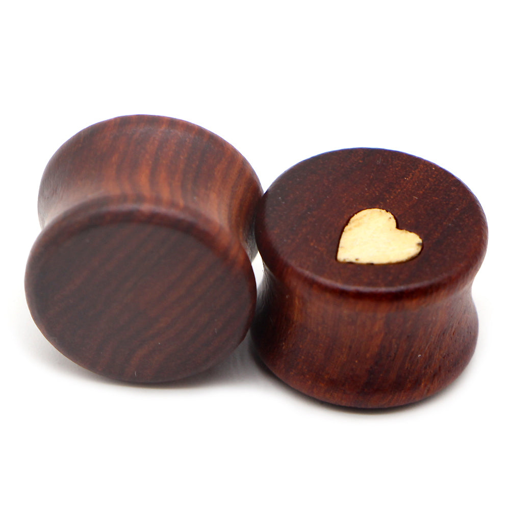 Wood plugs and tunnels earrings stretcher featuring a decorative heart, perfect for stretching earlobes in alternative fashion.