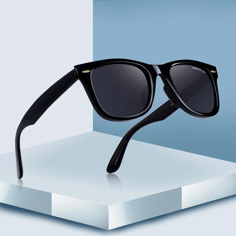 Classic retro polarized sunglasses with 100% UV protection on a sleek pedestal, perfect for summer outfits.