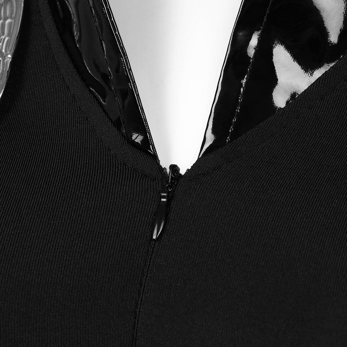 Close-up of zipper detail on black police officer costume dress, showcasing style and quality for cosplay or Halloween.