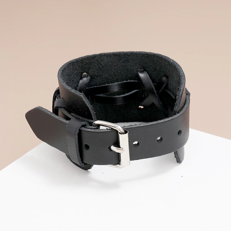 Unisex punk style wide genuine leather bracelet in black with metal buckle, perfect for men and women.