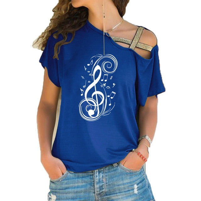 Women in a blue musical note graphic T-shirt with treble clef design and stylish shoulder cutouts.
