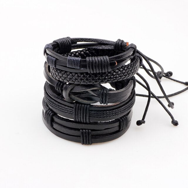 Set of 5 black leather bracelets in rock style with braided and knitted designs for men.