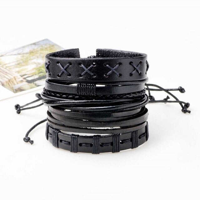 Set of 5 black leather bracelets in rock style, showcasing unique geometric designs and perfect for men's gothic fashion.