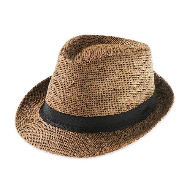 Vintage Jazz Cap in straw with black ribbon, perfect for summer and stylish stage performances.