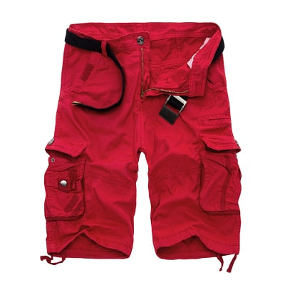 Red military shorts for men, urban style, practical fit with pockets, perfect for concerts and casual outfits.