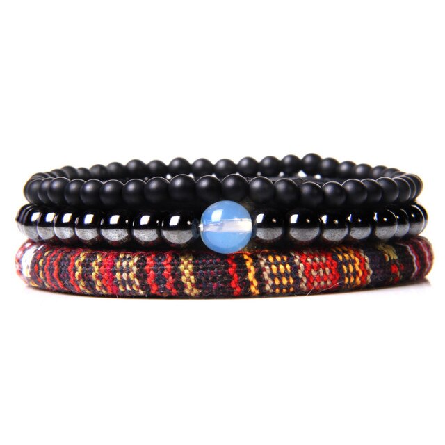 Stylish multiple charm bracelet featuring natural stone beads and vintage braided design.