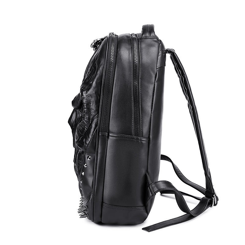 Side view of black PU leather backpack with skull design, zippers, and studs, perfect for gothic fashion.