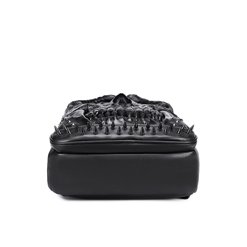 Black PU leather skull laptop backpack with studs, perfect for a gothic rock-inspired look.