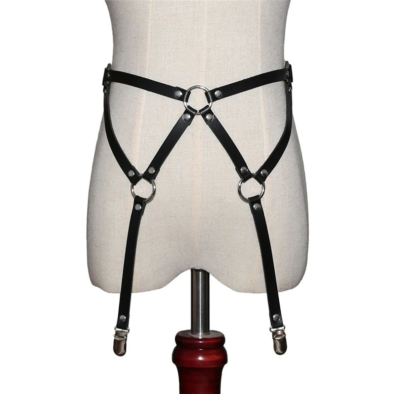 Stylish black PU leather body bondage suspenders belts on a mannequin, perfect for edgy women's fashion.
