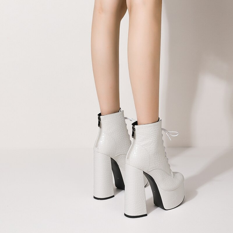 Stylish white PU leather ankle boots with square high heels and zipper closure, showcasing a casual fashion vibe.