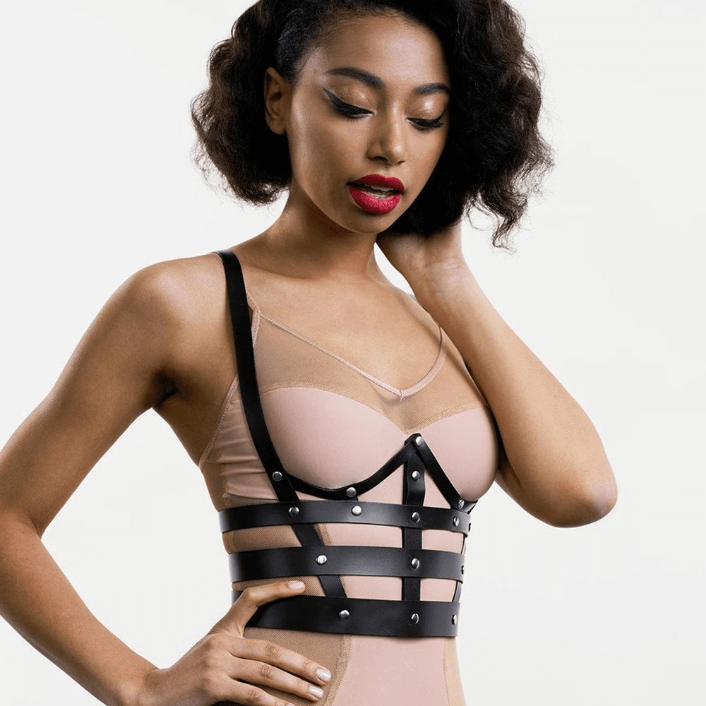 Black PU leather chest harness for women, featuring metal buttons, perfect for goth and rock-inspired outfits.