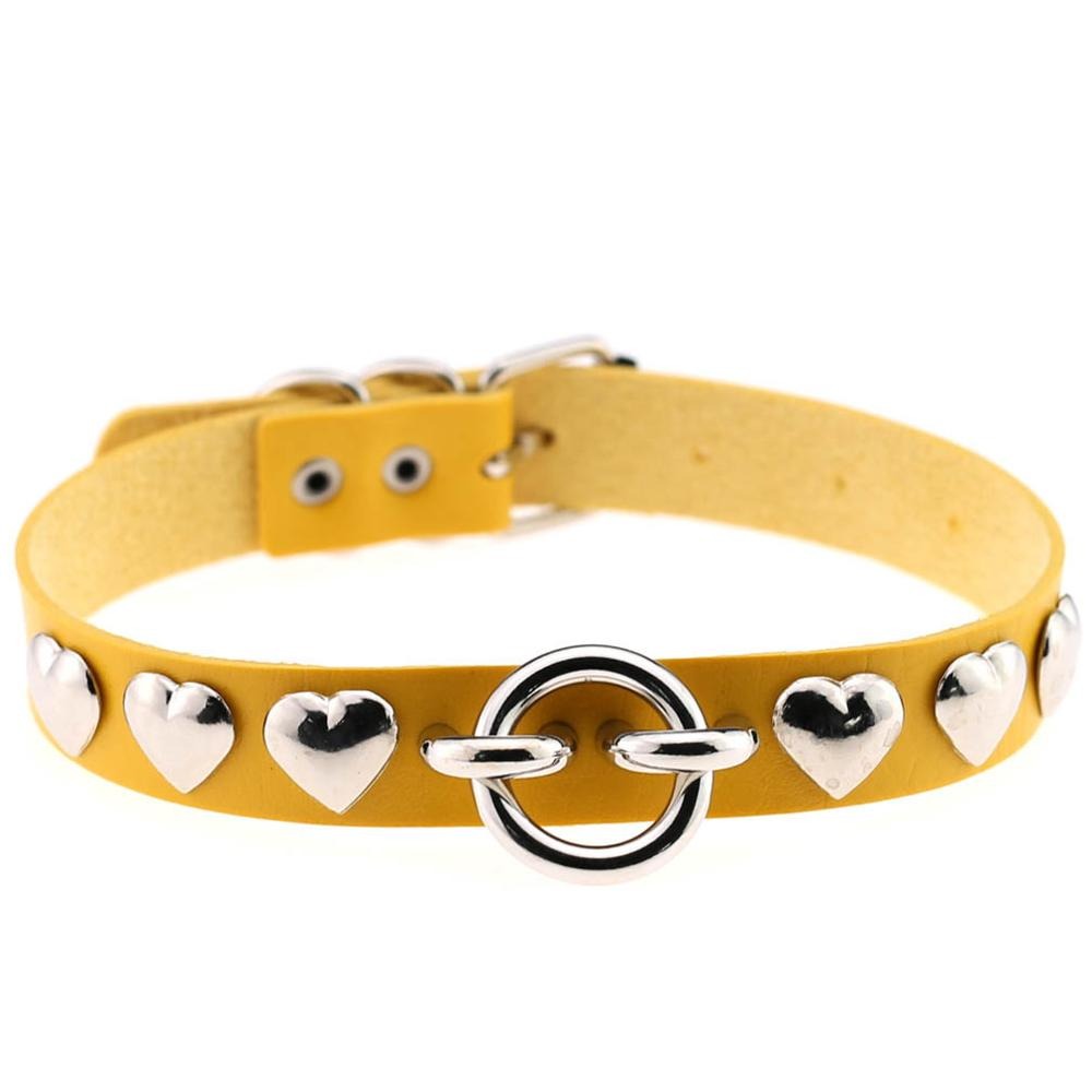 Vintage yellow PU leather choker with silver heart accents and circular buckle for a stylish, gothic look.