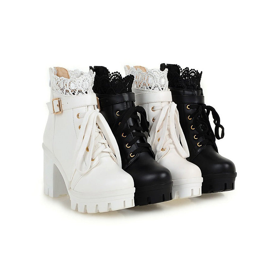 Gothic style winter women's platform ankle boots in black and white with lace and metal buckles.