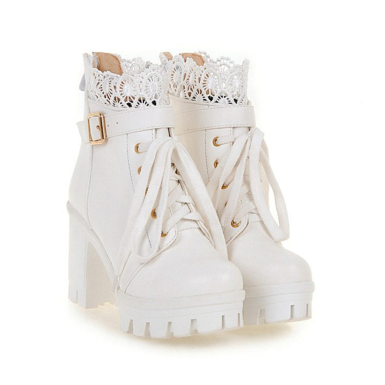 White gothic platform ankle boots with lace accents and metal buckles, stylish and comfortable for winter wear.
