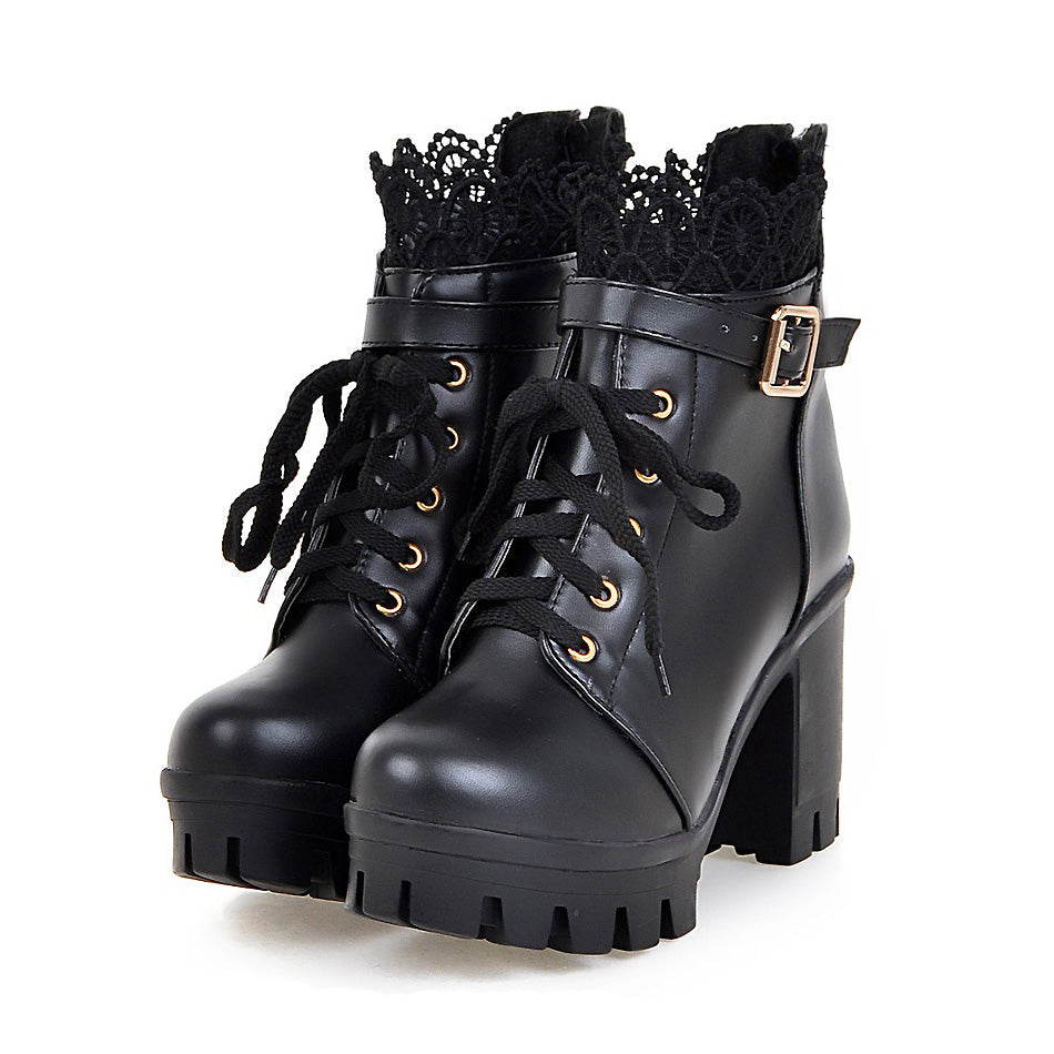 Gothic style black PU leather ankle boots with lace trim, lace-up design, and chunky heels for women.