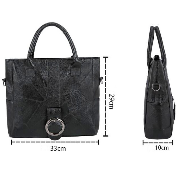 Stylish black PU leather handbag with ring decoration, featuring dual handles and ample interior pockets.