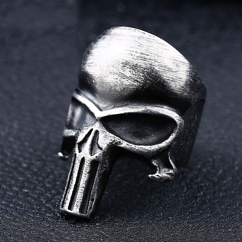 Close-up of a stainless steel Punisher skull ring, showcasing a polished rock style design for fashion jewelry lovers.