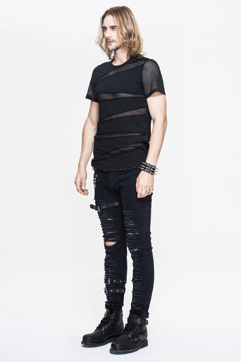 Men's punk black t-shirt with mesh details, paired with distressed black jeans and edgy boots.