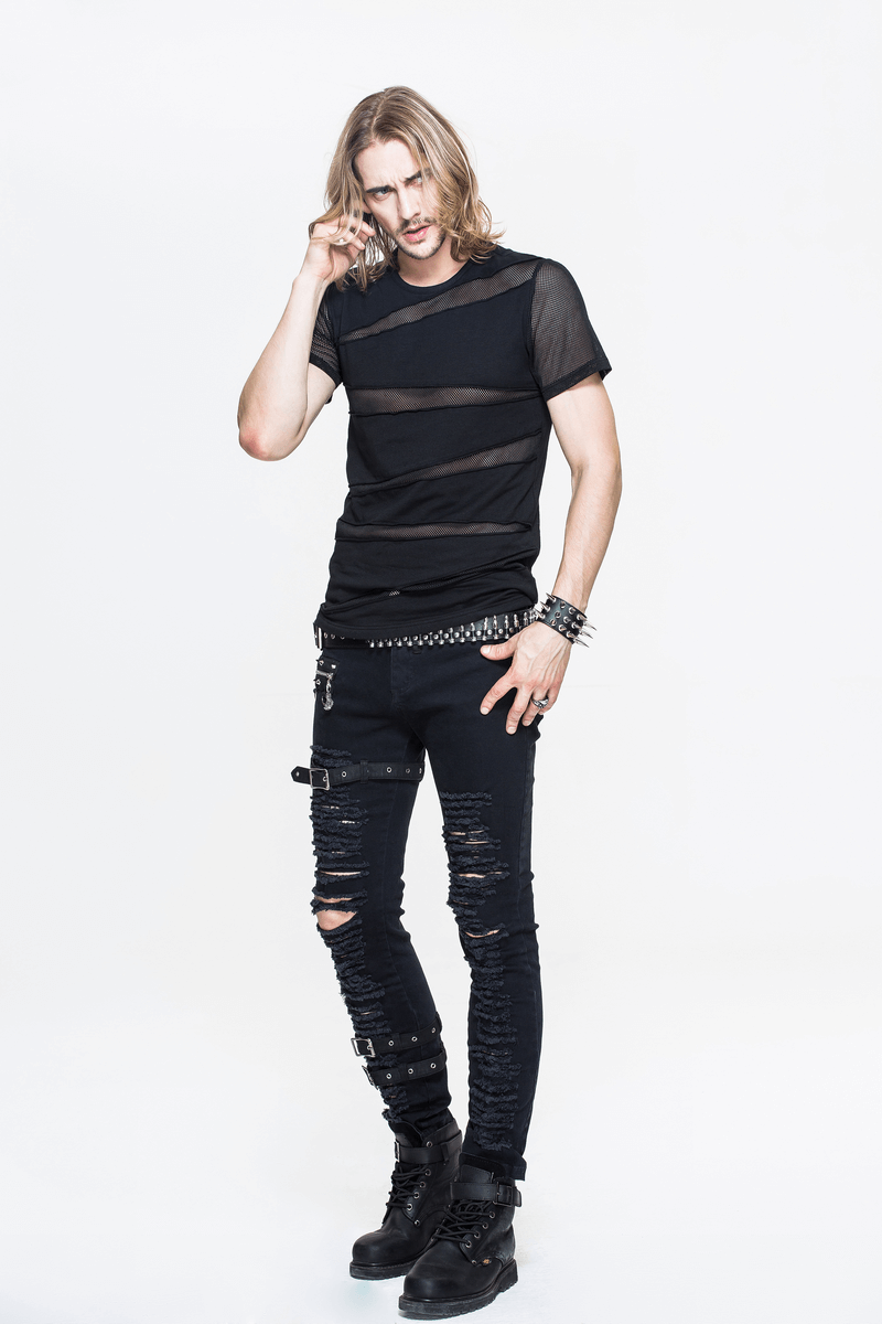 Stylish man wearing a punk black short sleeve t-shirt with mesh details and ripped jeans, perfect for casual gothic fashion.