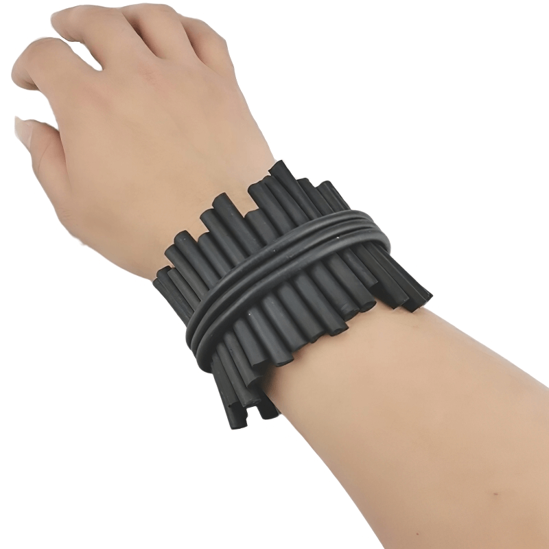 Handmade punk black rubber bracelets worn on wrist, perfect for adding a rock style to any outfit.