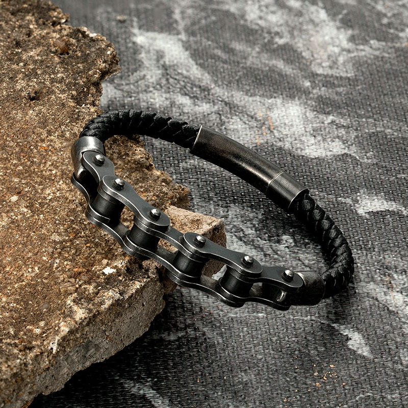 Punk style men's leather bracelet with stainless steel chain links, perfect for motorcycle enthusiasts and stylish outfits.