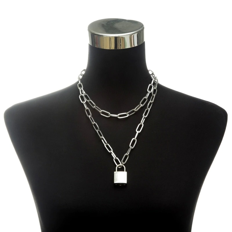 Punk chain choker necklace with circle and padlock on display for women's vintage style outfits.