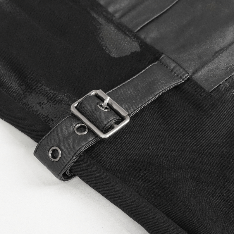 Close-up of a buckle strap on black gothic pants, showcasing punk fashion details and style.