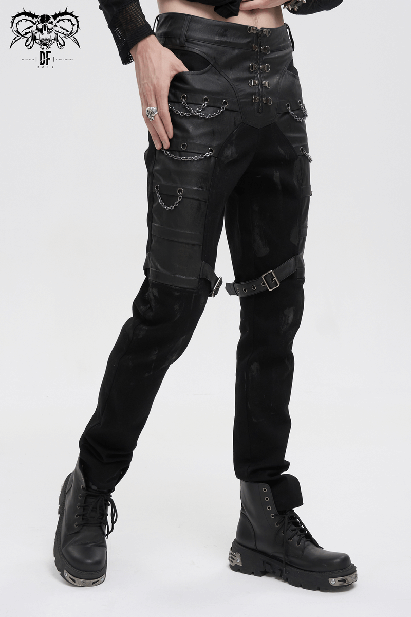 Stylish black fitted pants for men with buckle straps and chains, perfect for a gothic punk look.