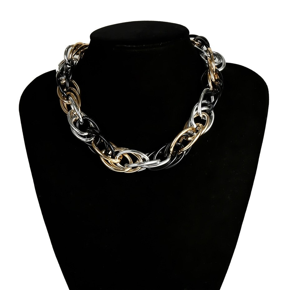 Massive unisex punk curb Cuban twisted necklace with vintage mix colors on display, perfect for bold outfits.