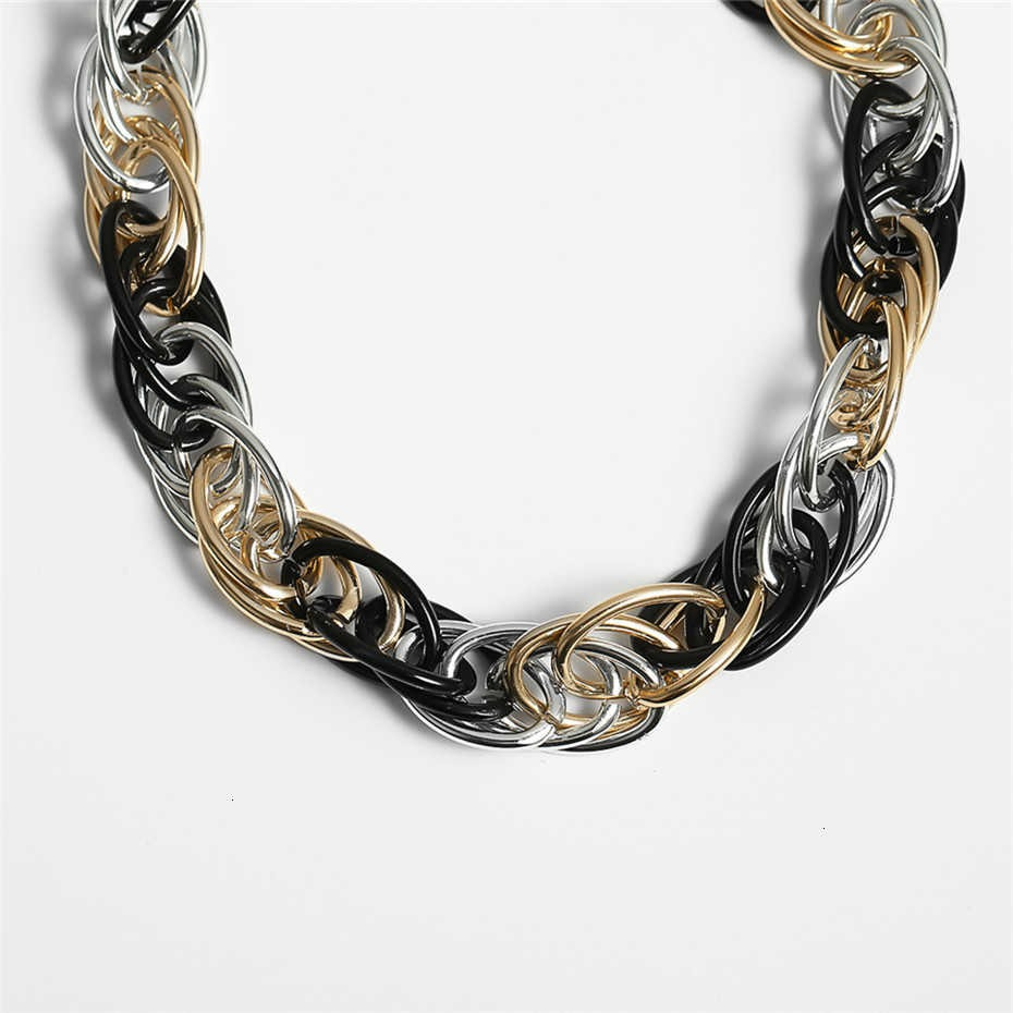Vintage punk curb Cuban twisted necklace in black, silver, and gold colors, a unisex jewelry statement piece.